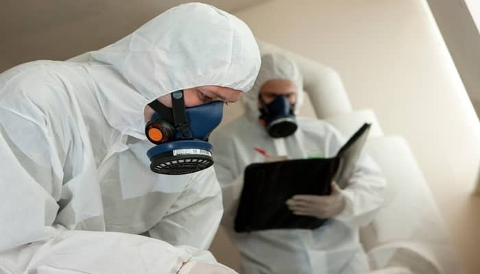 men in asbestos suit
